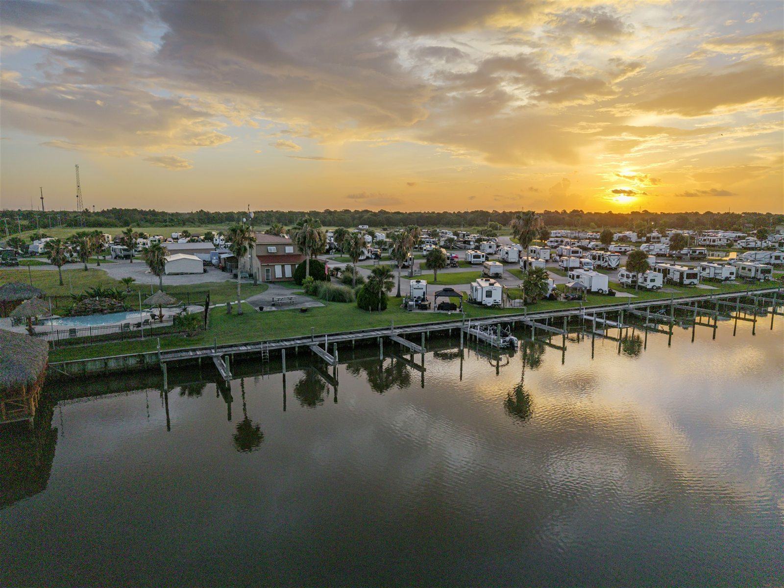 Waterfront RV Estates and Deepwater Marina at Golden Hour on Dickinson Bayou