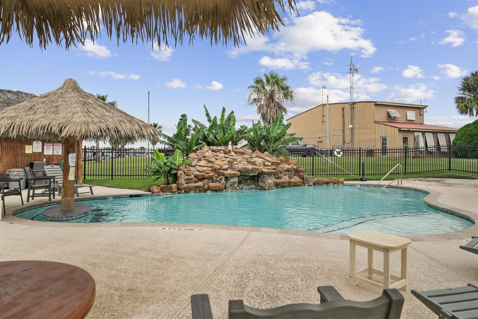 Pool #1 (21+ Adults Only): Resort Pool Rock Waterfall & Thatched Palapa Shaded Loungers